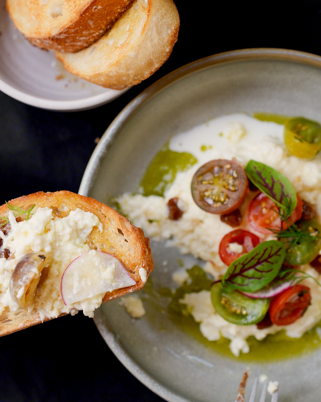 Creamy dish with cherry tomatoes and herbs