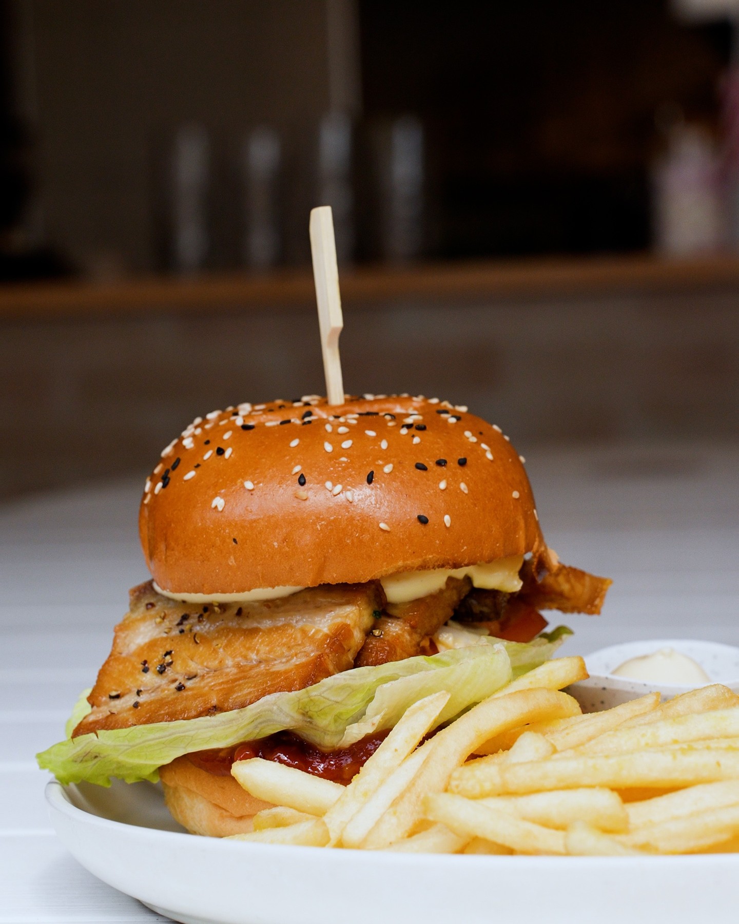 The Banh Mi Burger — crispy pork belly and chili relish