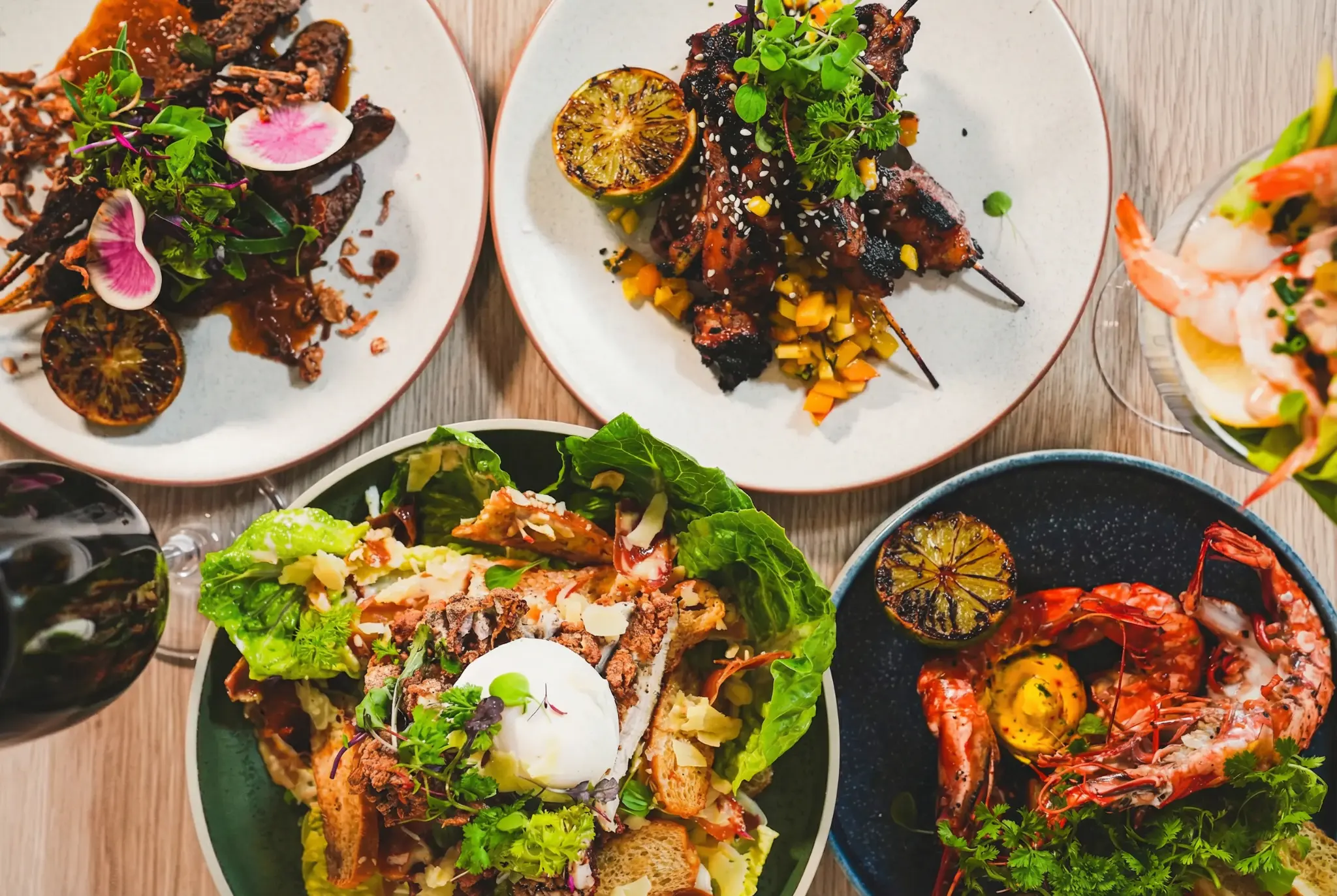 Graduation dinner at Poppies Southbank — share plates and cocktails near the BCEC Brisbane